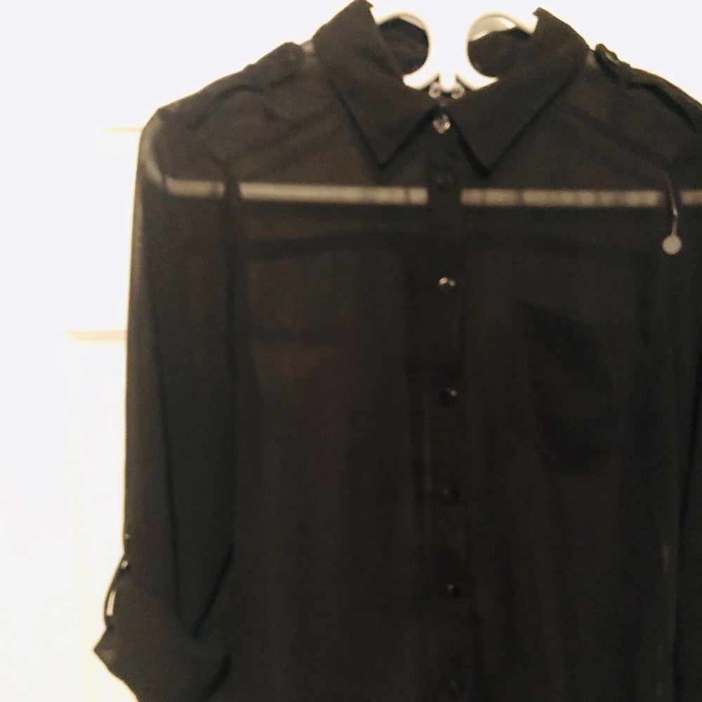 selling a black blouse